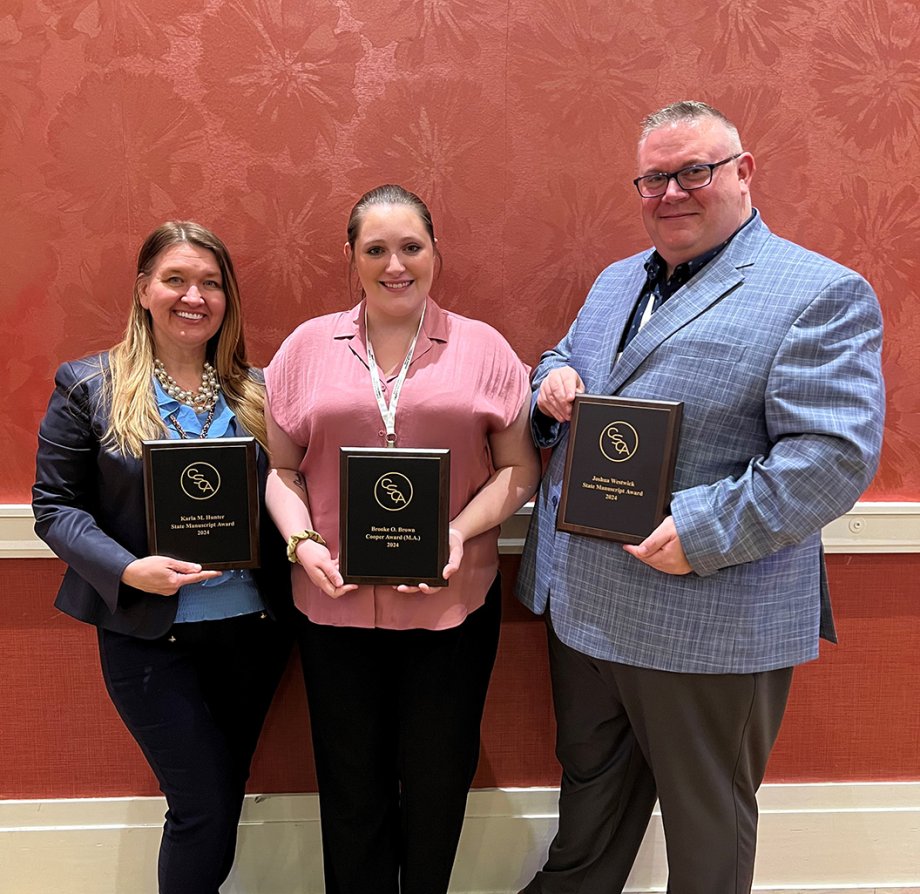 Karla Hunter, Brooke Brown and Josh Westwick with their awards at the Central States Communication Association in Grand Rapids, Michigan. 