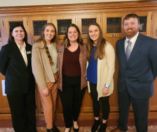 Carrie McCloskey, Faith Weiland, Rep. Taylor Rehfeldt, Jodi DeVaal and John Boehnke in the lobby of the House Chamber during “Hit the Hill Day.” 