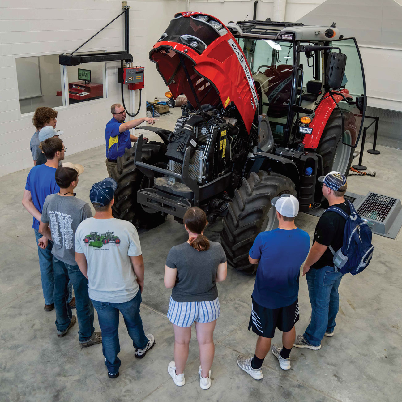 Ag Engineering students encircle a tractor