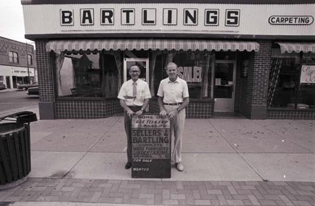 Bob and Lorne Bartling in front of Bartlings Furniture Store in downtown Brookings, South Dakota, 1989