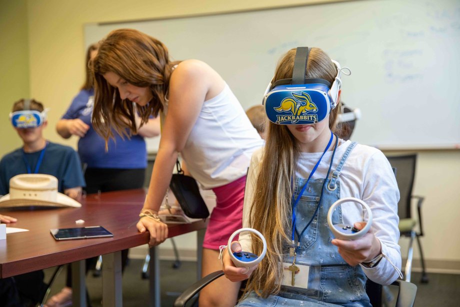 students using virtual reality headsets