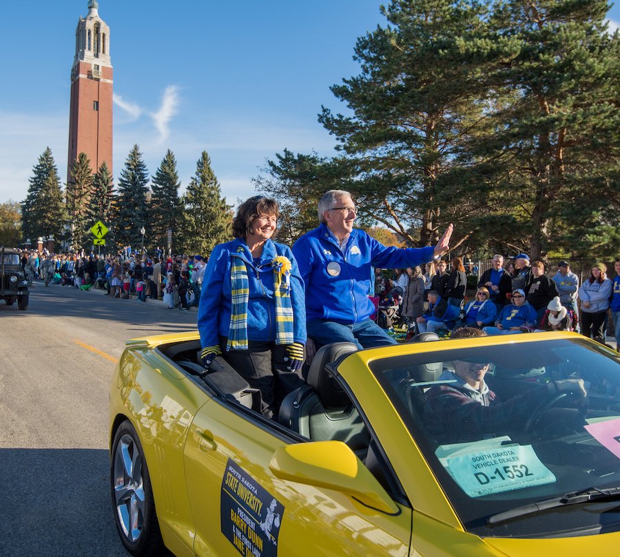 Barry and Jane Dunn riding in car during Hobo Day parade