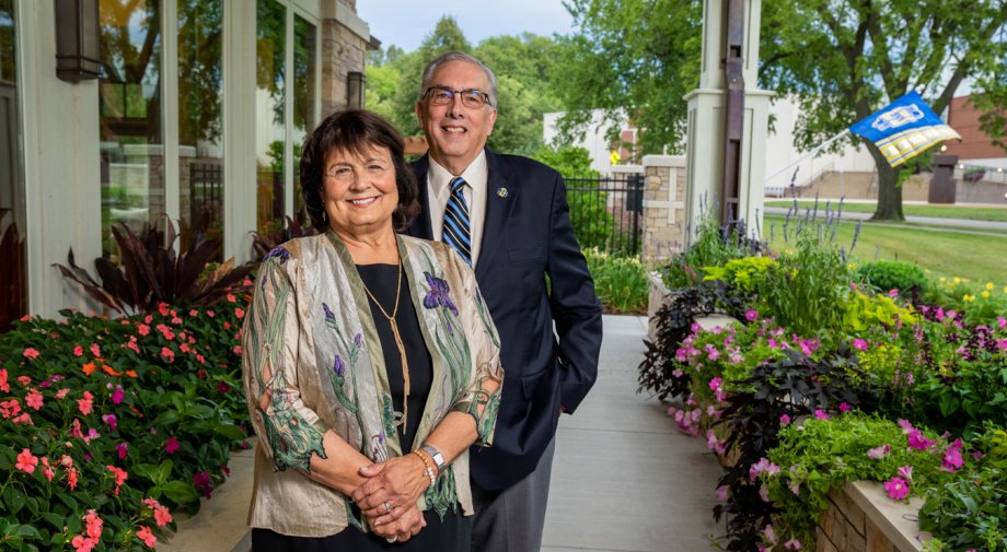 President Barry H. Dunn with his wife, Jane, in front of their campus home.