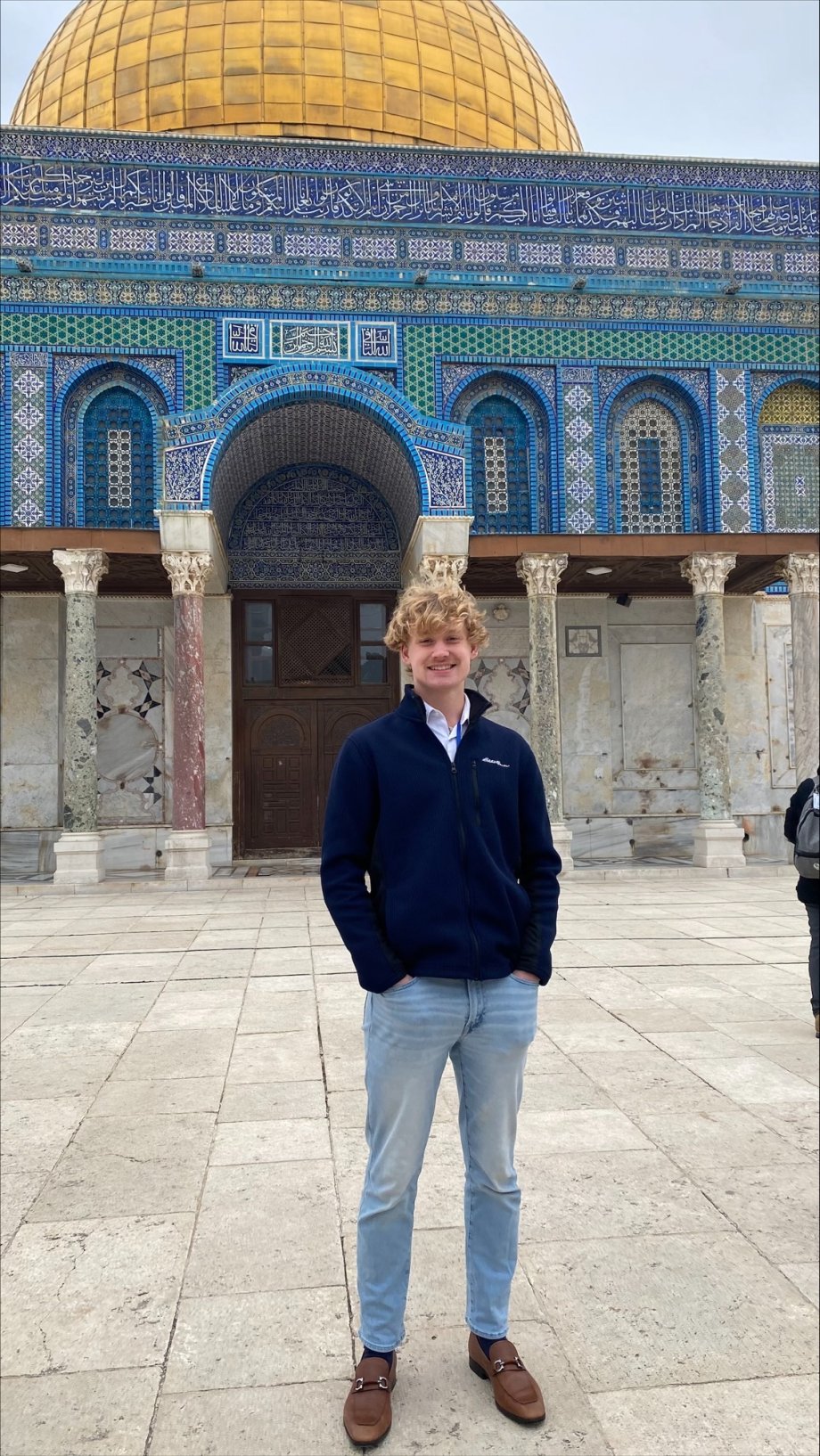 SDSU student Nick Grote poses in front of Temple Mount in Jerusalem during his Dec. 27-Jan. 7 tour of Israel with 69 other college students from throughout the United States. The trip was organized by the Jewish National Fund, which sought out students who were campus leaders.
