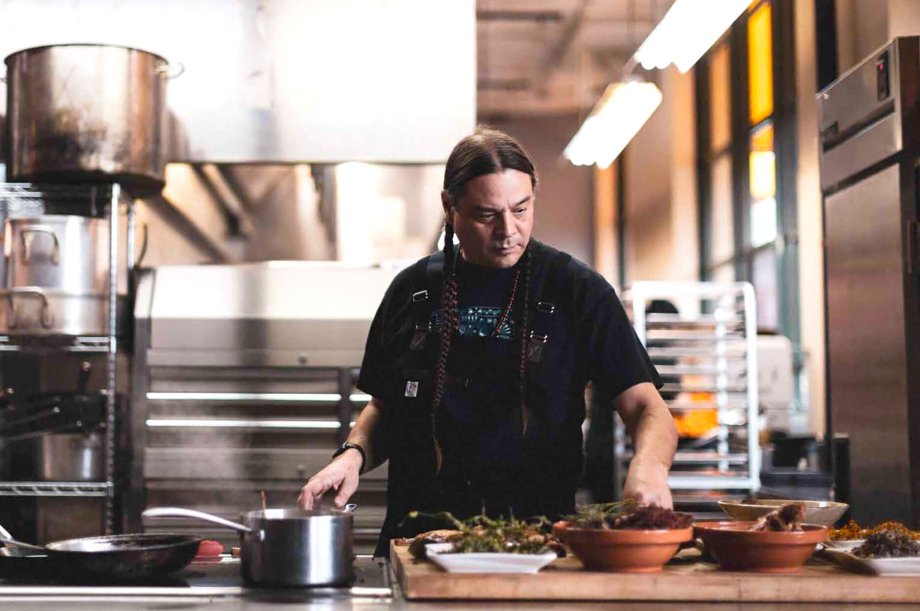 Chef Sean Sherman, also known as "The Sioux Chef," cooks in his Minneapolis-based kitchen.