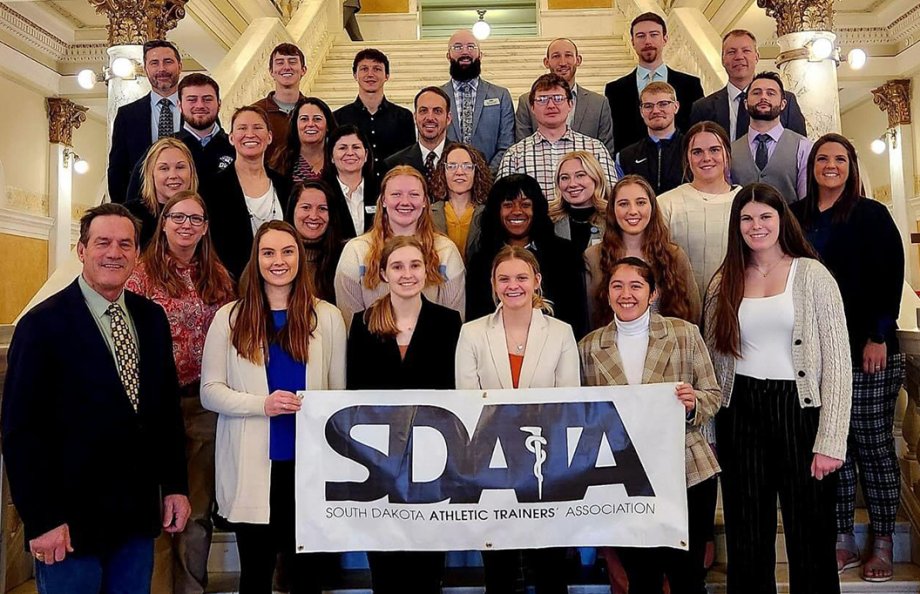 South Dakota athletic trainers gather on the Capitol steps with Lt. Gov. Larry Rhoden during the South Dakota Athletic Trainers’ Association “Hit the Hill Day” in Pierre. 