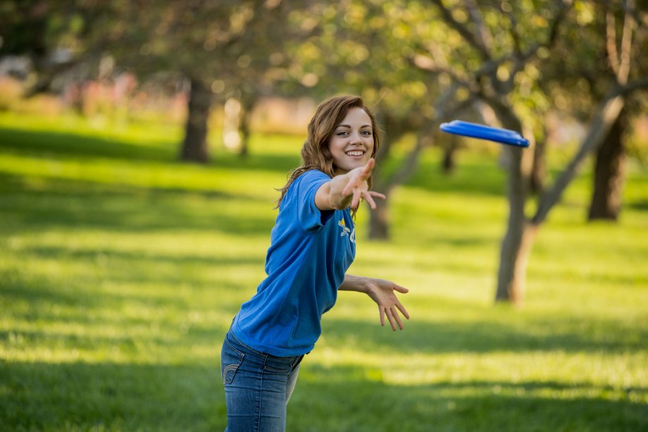 Student throwing a frisbee