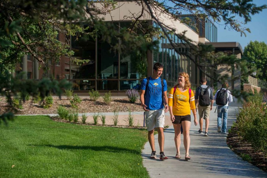 Students walking outside the Enrollment Services Center