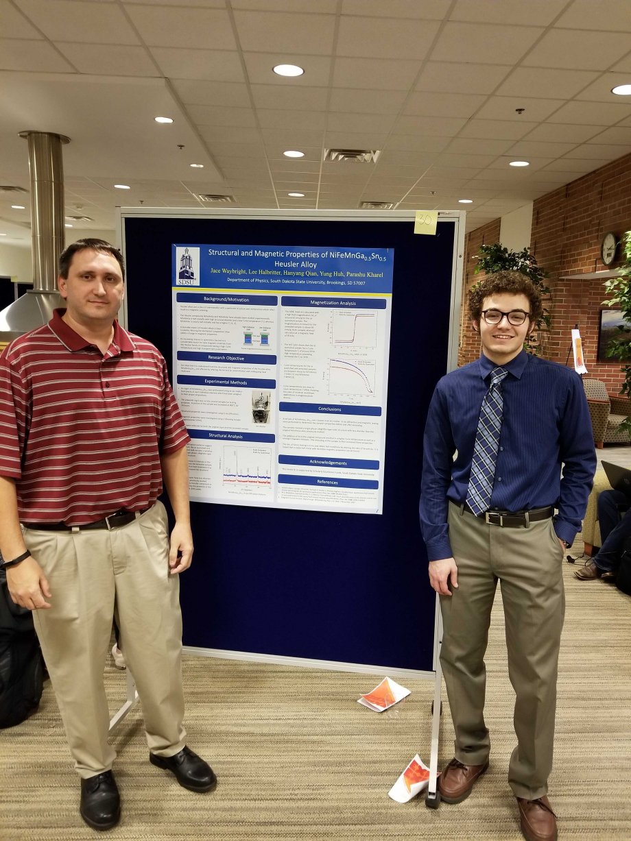 Jace and Lee presenting poster