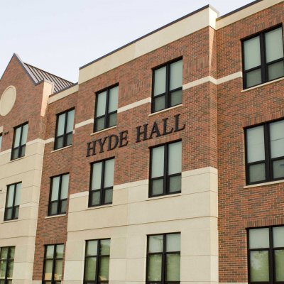 Hyde Hall sign with windows on the building