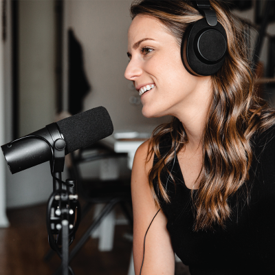Woman with Headphones and recording microphone
