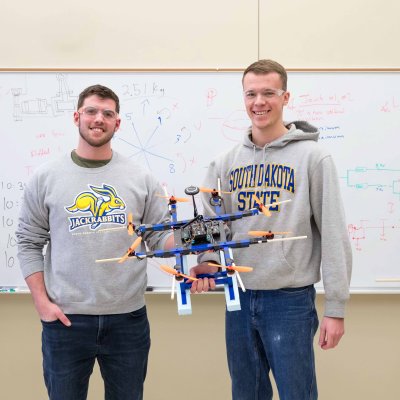 2020 NASA Drone Team - two students with sample drone