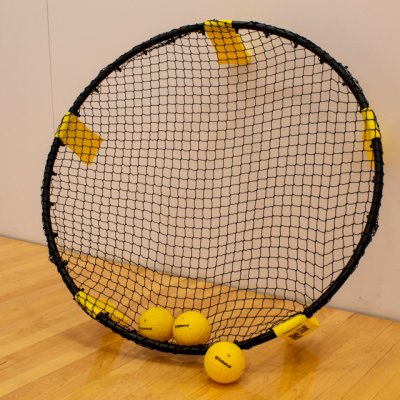 1 spikeball set with 3 yellow balls