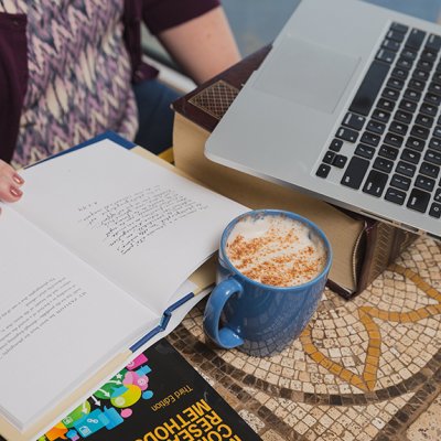 image of laptop, book and coffee