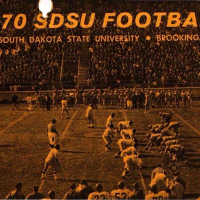 Cover of the 1970 SDSU Football Media Guide -  image of team playing football