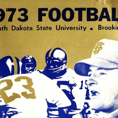 Cover of the 1973 SDSU Football Media Guide -  images of team Coach Gregory and players