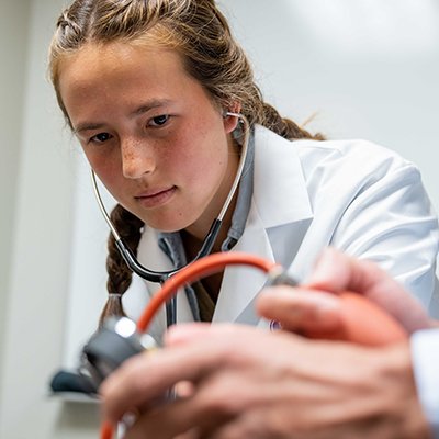 Healthcare student in a healthcare lab setting