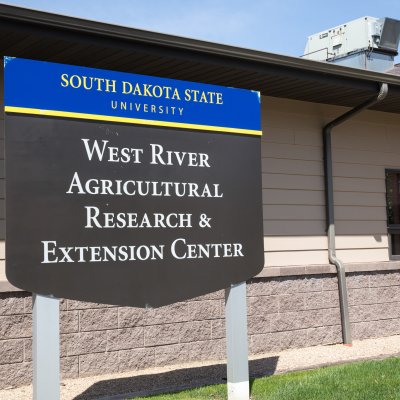 An image showing a descriptive sign post at the West River Agricultural Research and Extension Center (WRAC) of SOuth Dakota State University