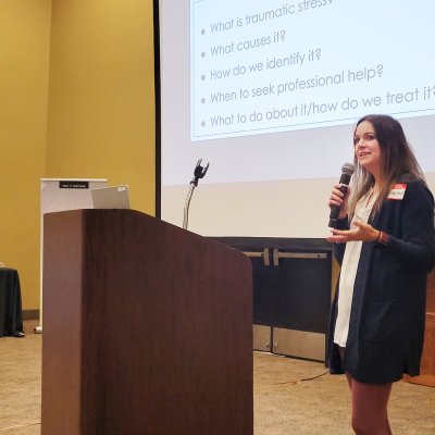 Amanda Reed, a licensed clinical psychologist in Sioux Falls, speaks on traumatic stress and emergency services at a first responder summit held Aug. 25 in Chamberlain.