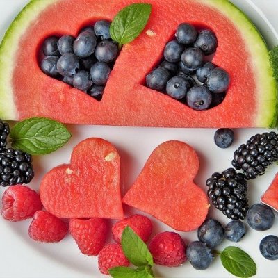 Watermelon and berries on a plate.