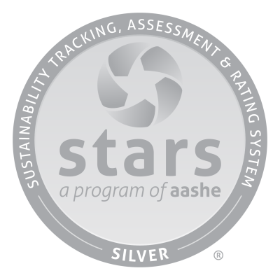 STARS Silver Logo - a silver ring with white lettering on the top that says "Sustainability Tracking, Assessment & Rating System." The bottom says Bronze. Inside the ring is a lighter silver and has the STARS star symbol and underneath it says, "stars" and below that it says "a program of aashe."
