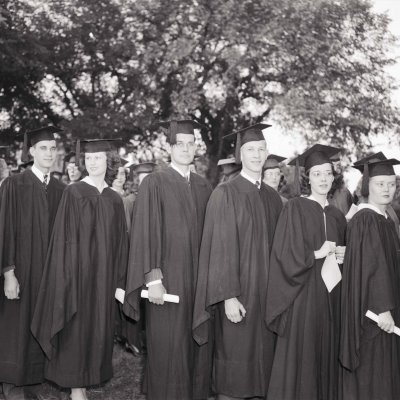 SDSC graduates of 1948 standing in line.