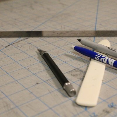 BluePrint cutting mat with tools laying on it