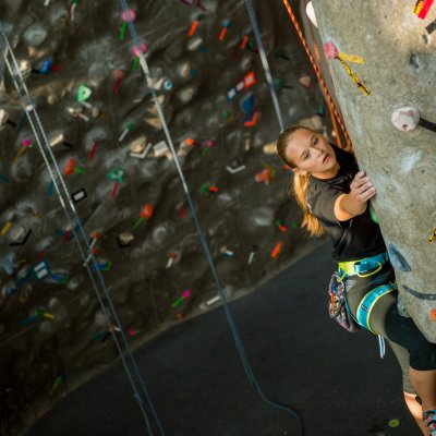 Student climbing at Wellness Center.