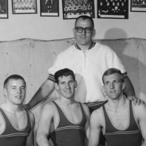 Jim Koch (right) with Coach Frank Kurtenbach (back) and two other senior wrestlers, Tom Kreger (left) and Jon McNitt (center), 1969