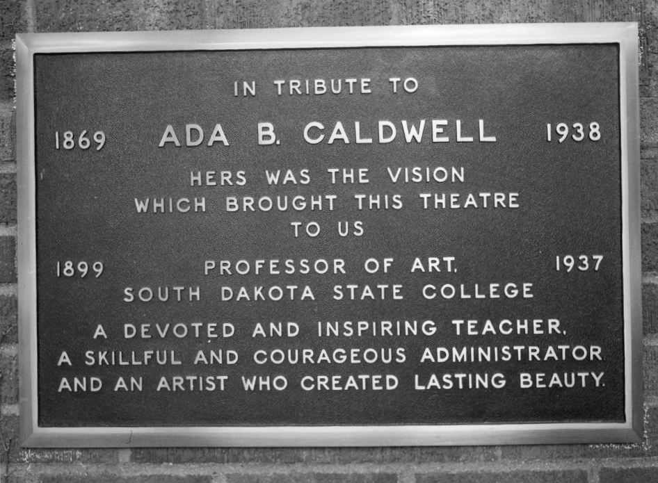 Ada B. Caldwell plaque dedication in Coolidge Sylvan Theatre at South Dakota State College