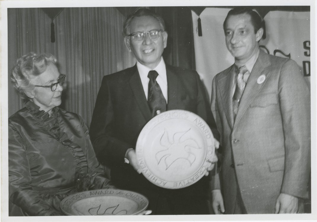 •	Oscar Howe (center) receives the First Annual South Dakota Governor’s Award for Artistic Achievement from Governor Richard Kneip and Jeanette Lusk, 1973. Oscar Howe Papers, Archives and Special Collections, University of South Dakota. Photographer unknown.