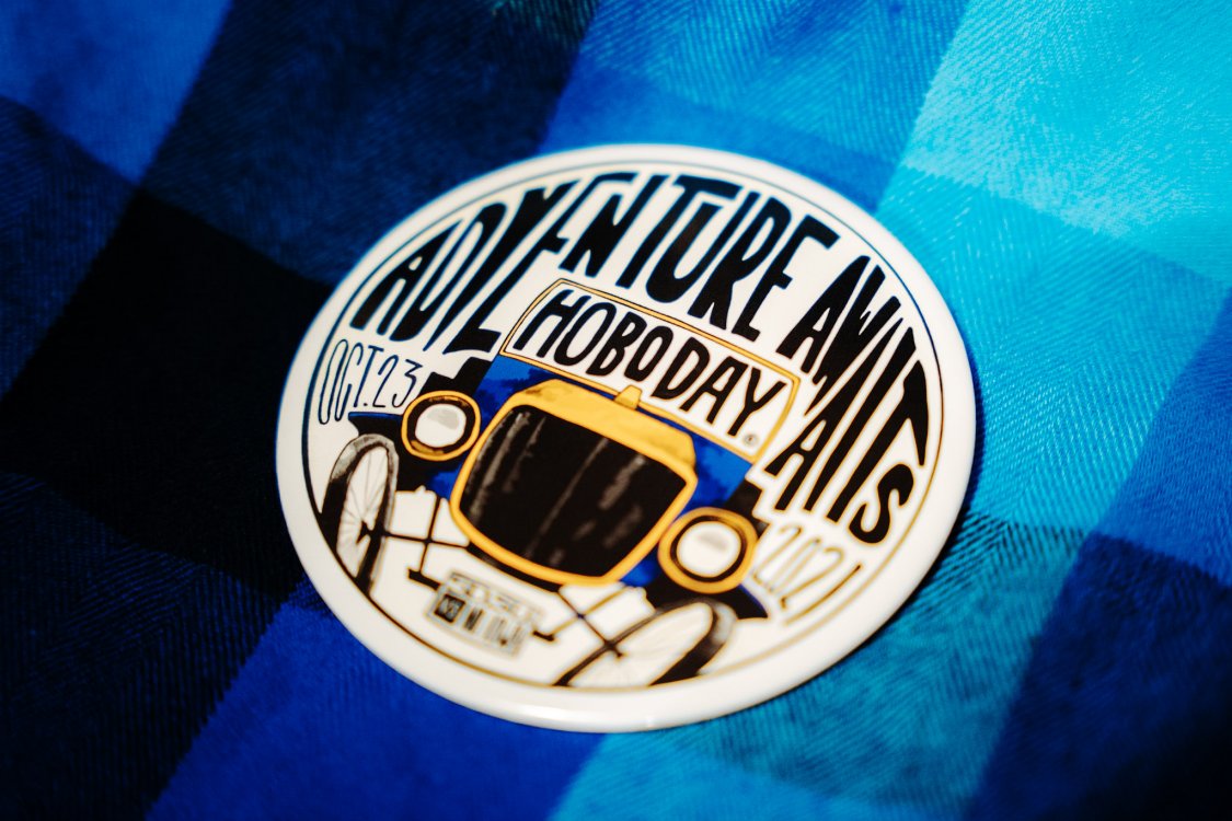 2021 Hobo Day button on blue plaid