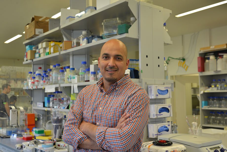 Jaime Lopez, asst biology and micro prof, in his lab
