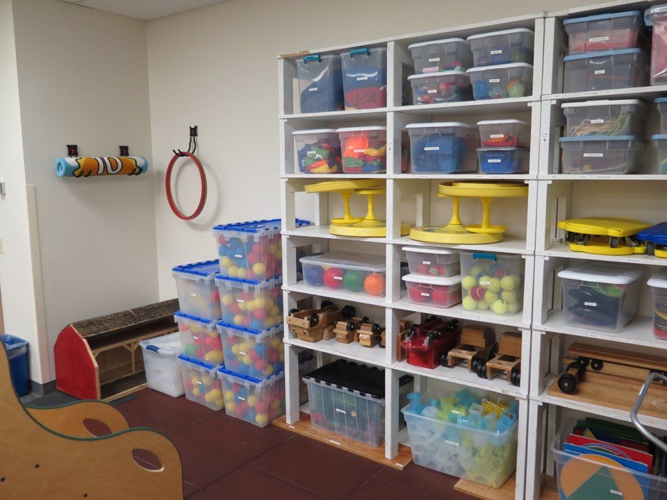 In the large motor room there are a variety of materials children can use to move their bodies. There are sit and spins, bowling materials, hoops, beanbags and much more.