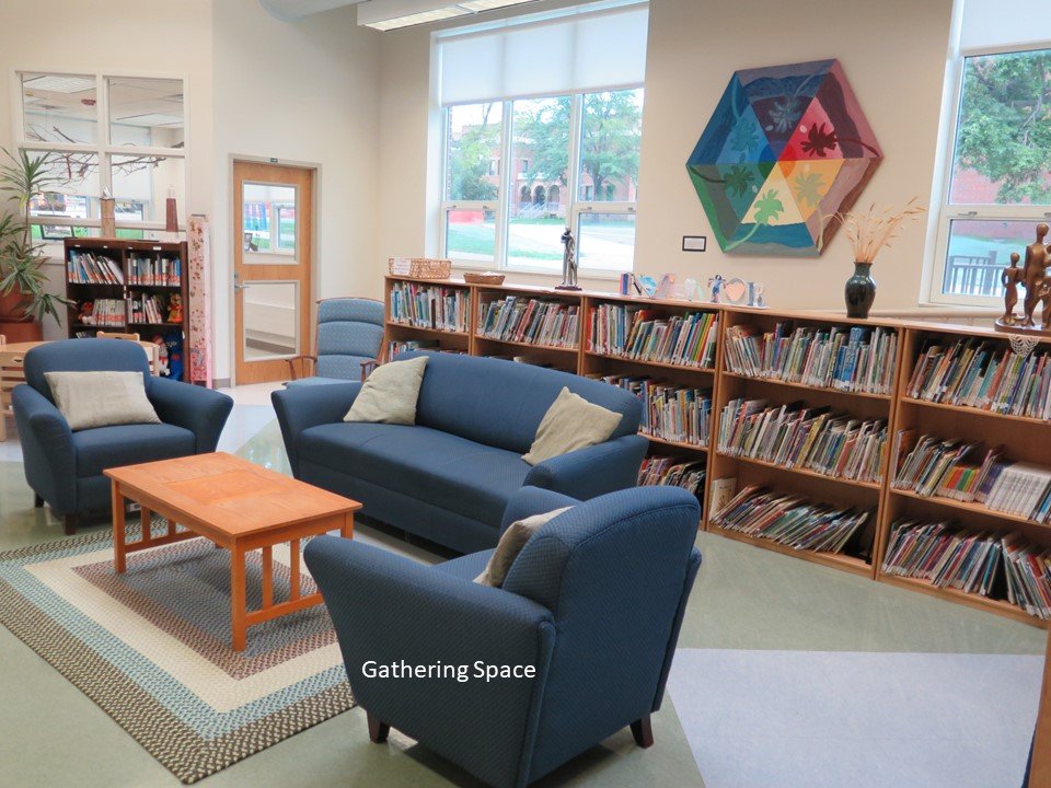 The gathering space that also holds a mini library section. 