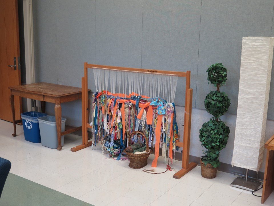 The collaborative weaving loom in the gathering space. 