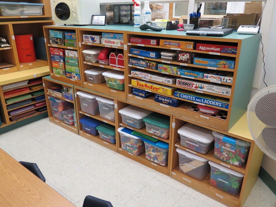 This is another viewpoint of the Out of School Time room with many different manipulatives, puzzles and games.
