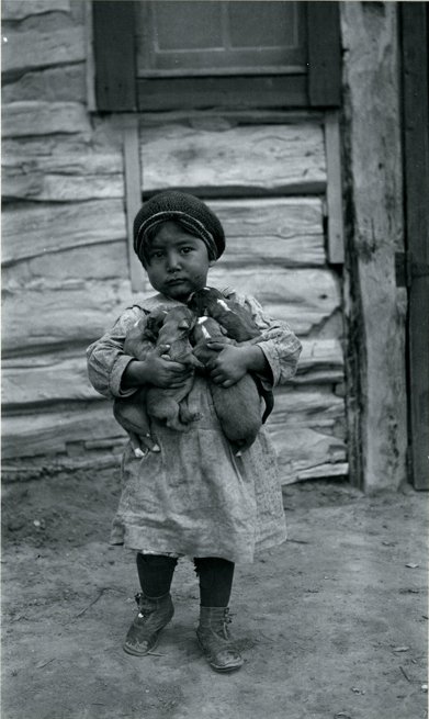 Eugene Buechel, Sam Martha May Fish with an Armful of Pets, photograph, 1931 (printed 1974), SDAM 1984.04.26.