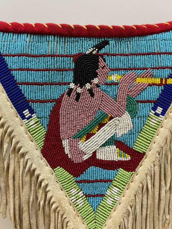 Virginia Poorman. The Flute Player, 1989. Seed beads on hide. Courtesy of Bryan Akipa.