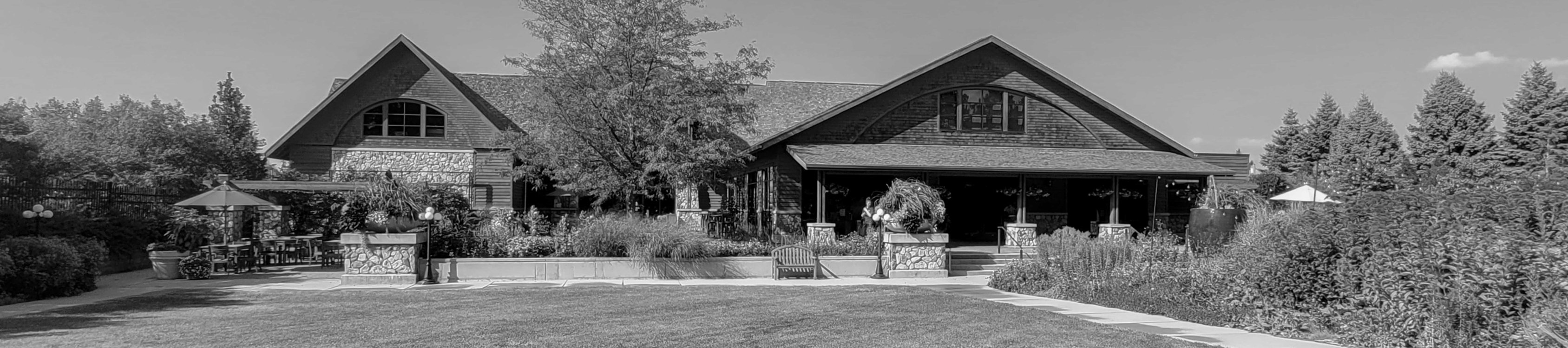 Greyscale picture of the main building at McCrory Garden