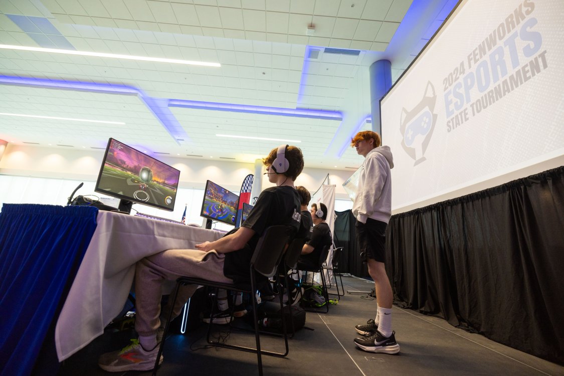 Participants gaming on a stage