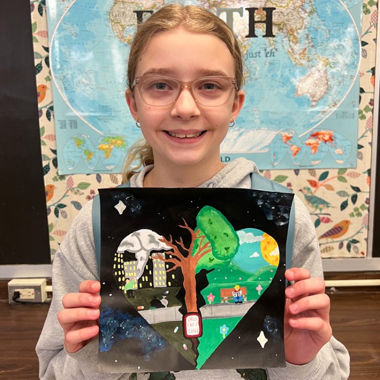 Photo of Ava Barnard and her submission for the LaunchSkills Art Contest