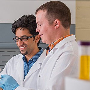 Two students in a research lab