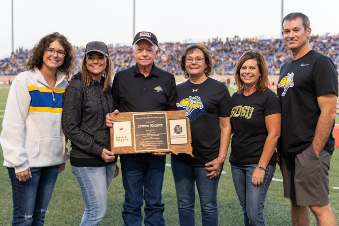 James Krantz, shown with his family at the Beef Bowl, is honored as the 2023 recipient of the South Dakota State University Friend of the Beef Industry award.