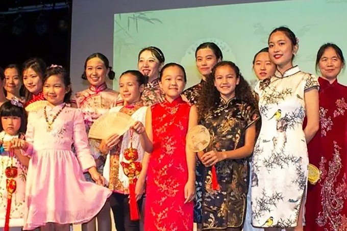 A group of participants on stage at a past China Night at South Dakota State University.