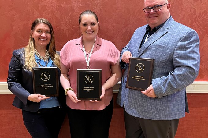 Karla Hunter, Brooke Brown and Josh Westwick with their awards at the Central States Communication Association in Grand Rapids, Michigan. 