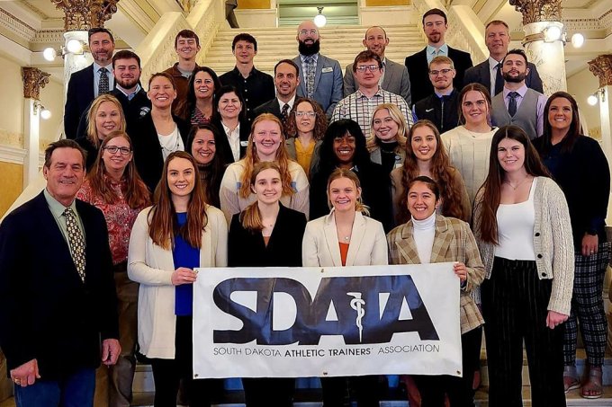 South Dakota athletic trainers gather on the Capitol steps with Lt. Gov. Larry Rhoden during the South Dakota Athletic Trainers’ Association “Hit the Hill Day” in Pierre. 