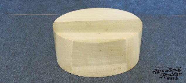 1991:025:001 Round wooden hat block