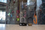 Climbing equipment framed in front of a rock wall
