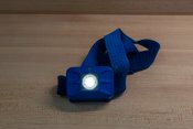 Blue headlamp with the light on